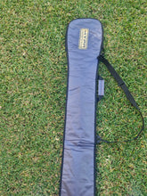 HYPR Paddle Bag – Premium Padded SUP & Surfboard Carry Case resting on grass.